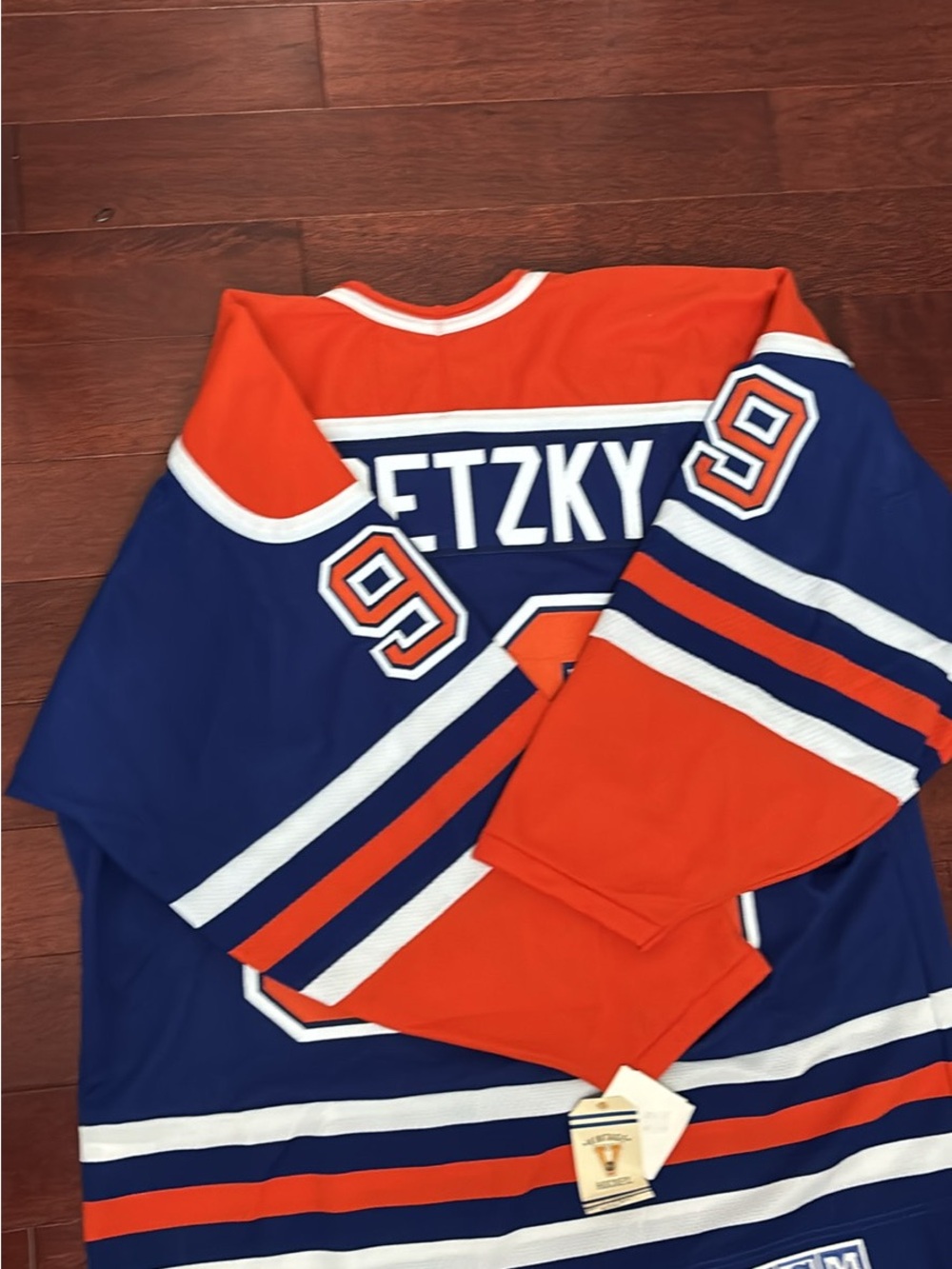 CCM Blue and Orange Edmonton Oilers Captain Hockey Jersey - Picture 5 of 5